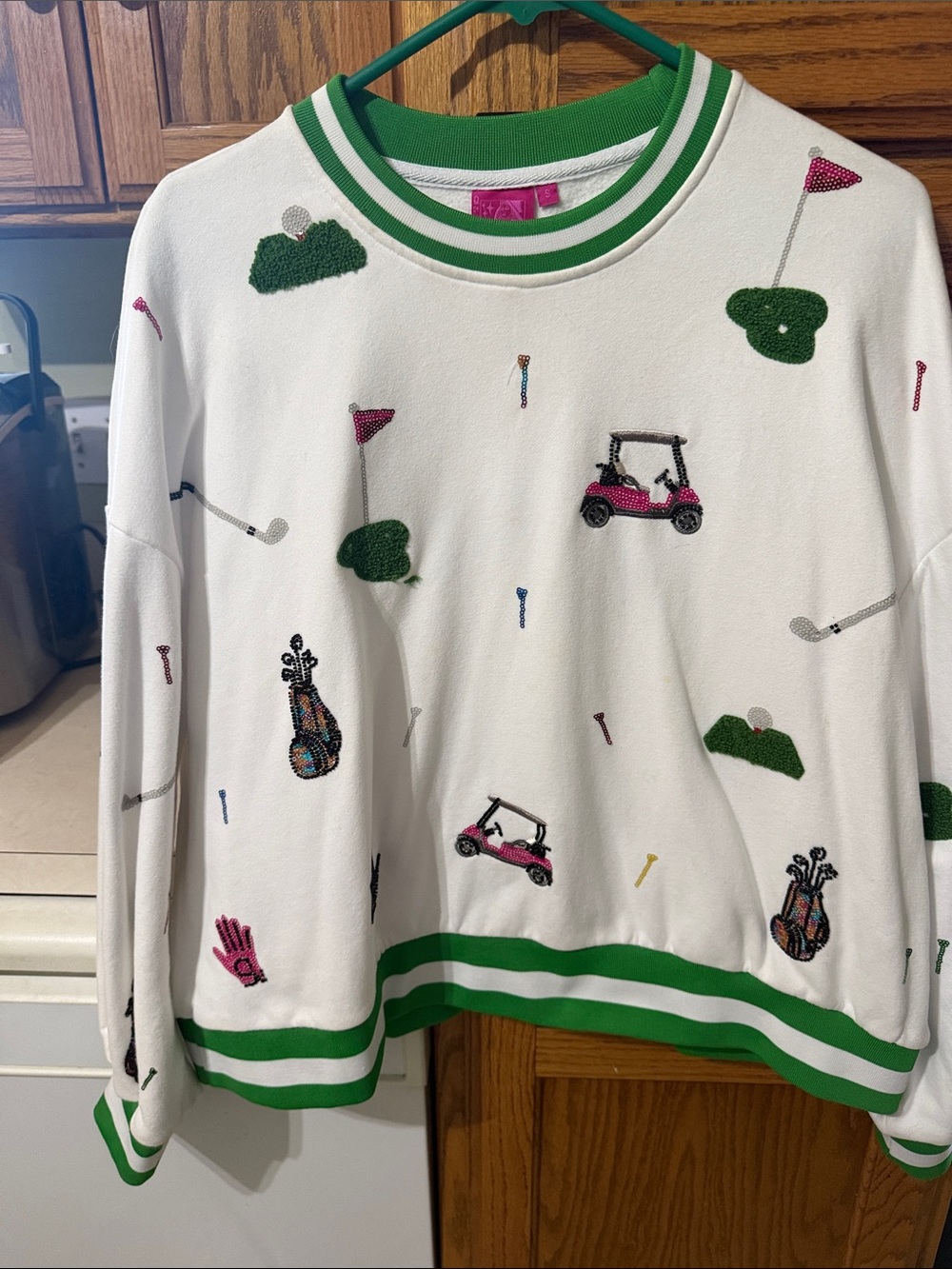 QUEEN OF SPARKLES White Golf Motif Crewneck with Green Trim and Pink Accents
